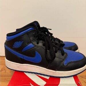Nike Air Jordan’s Black and Blue High-Top Sneakers